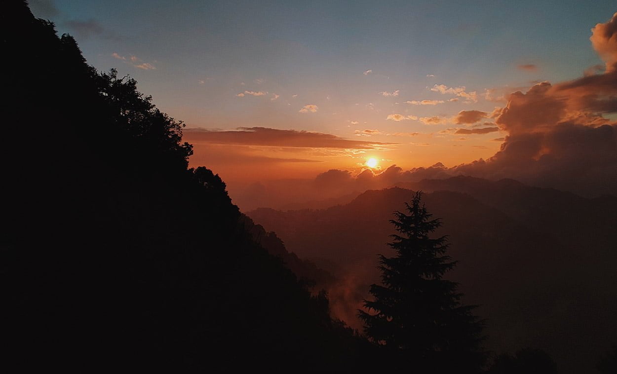 Lal Tibba, Landour, Mussoorie's highest point, provides a panoramic view of the Himalayan peaks, including the majestic Bandarpoonch and Gangotri.