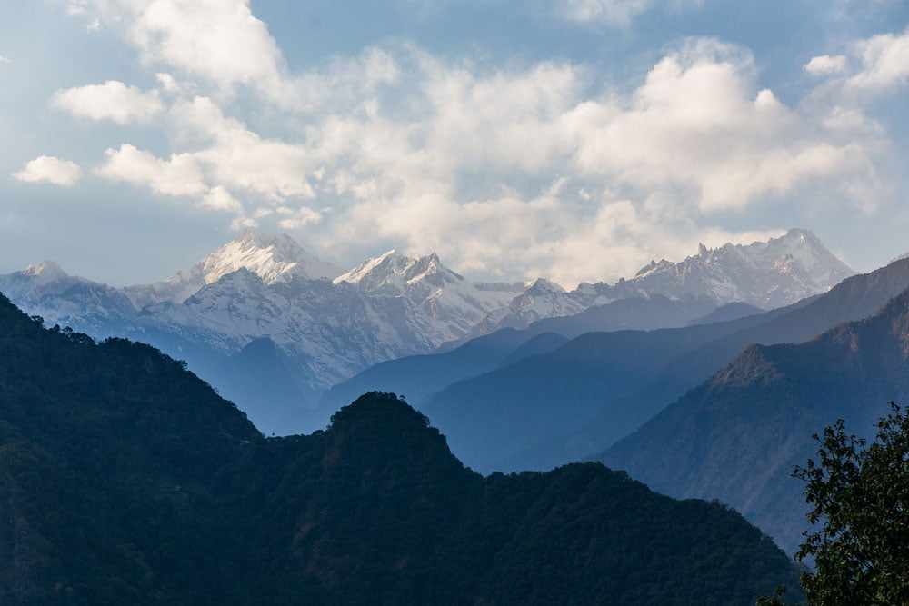 Panoramic view from Darjeeling Observatory Hill, showcasing the expansive horizon with the Himalayan range in the backdrop.