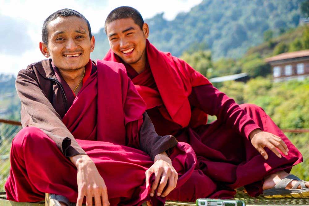Warm smiles of Bhutan's friendly residents, embodying the nation's welcoming spirit.
