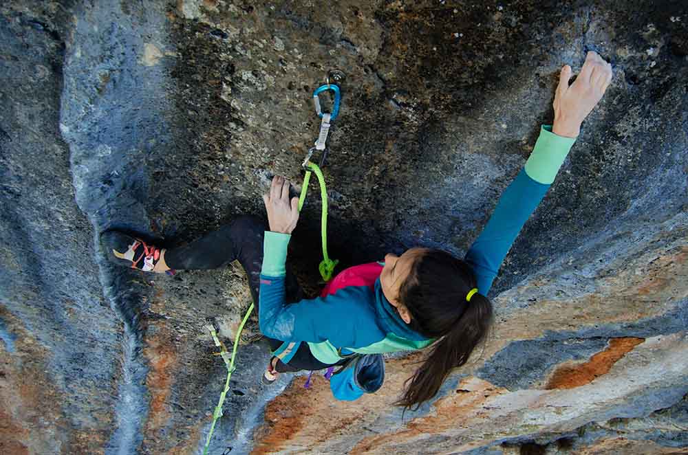 Climbers scaling the rock formations near Thimphu, exemplifying the Adventure Activities in Bhutan.